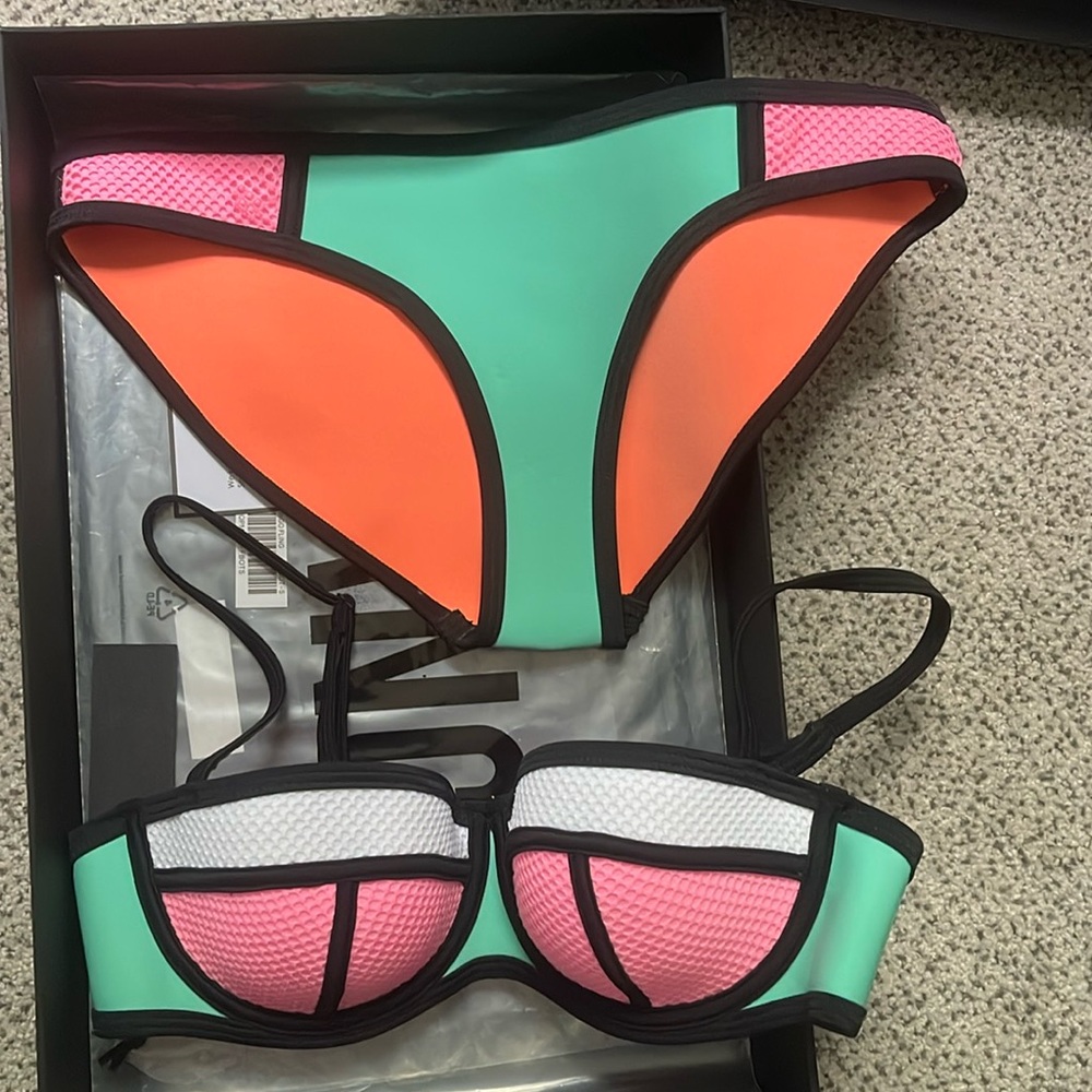 Brand new size Small Triangl swimsuit